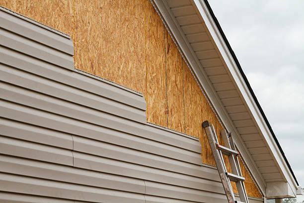 Professional Wood Siding technician working in Freeport, NY